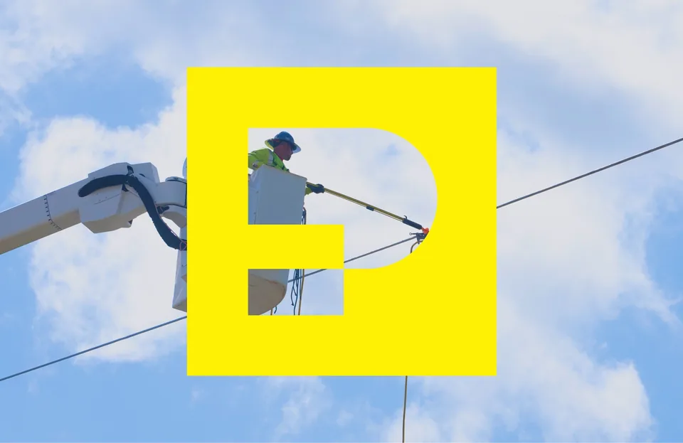 Phillips Industries mark over a lineworker photo